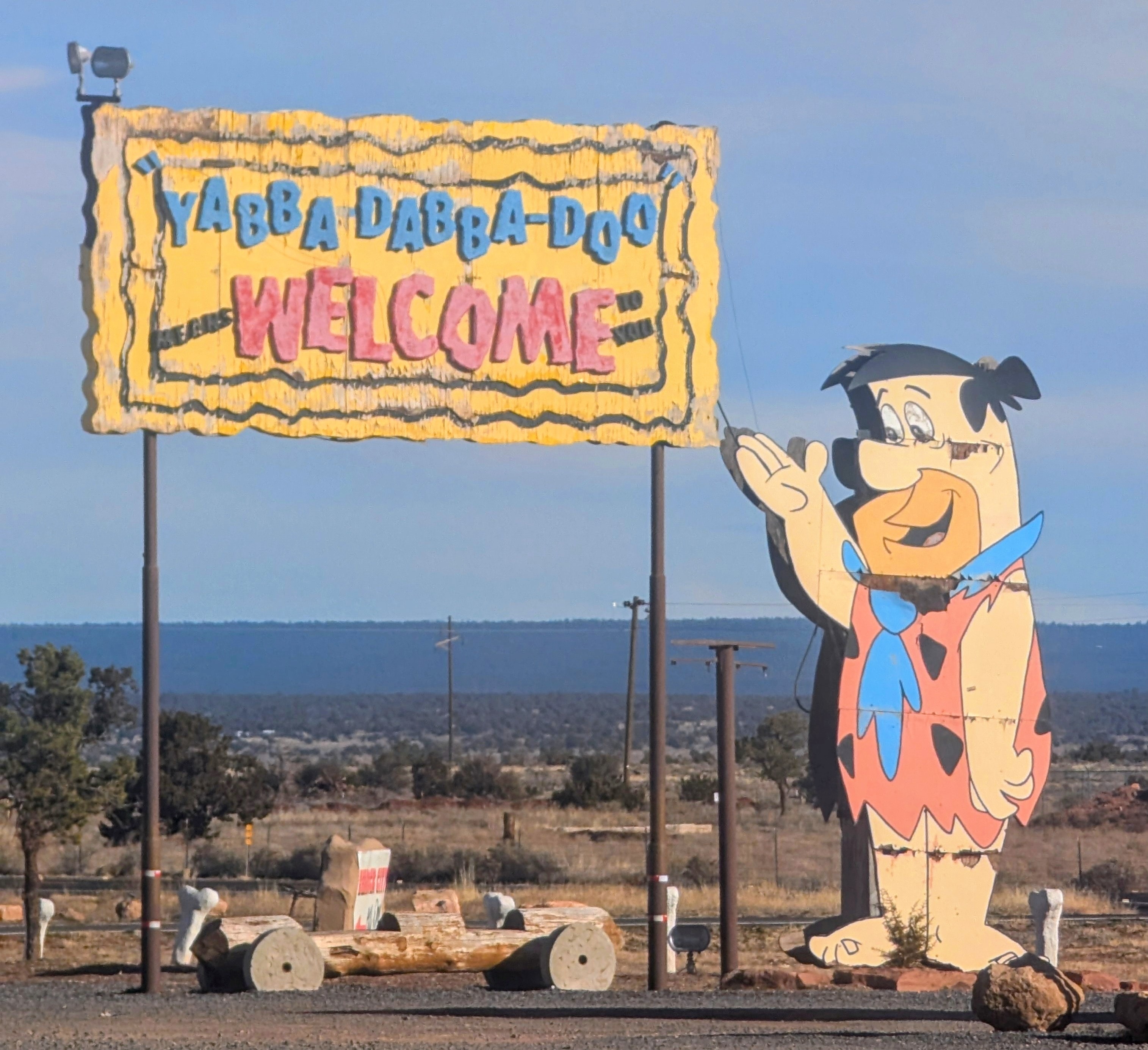 Two girls riding tricycles at Bedrock City, Raptor Ranch Valle Arizona